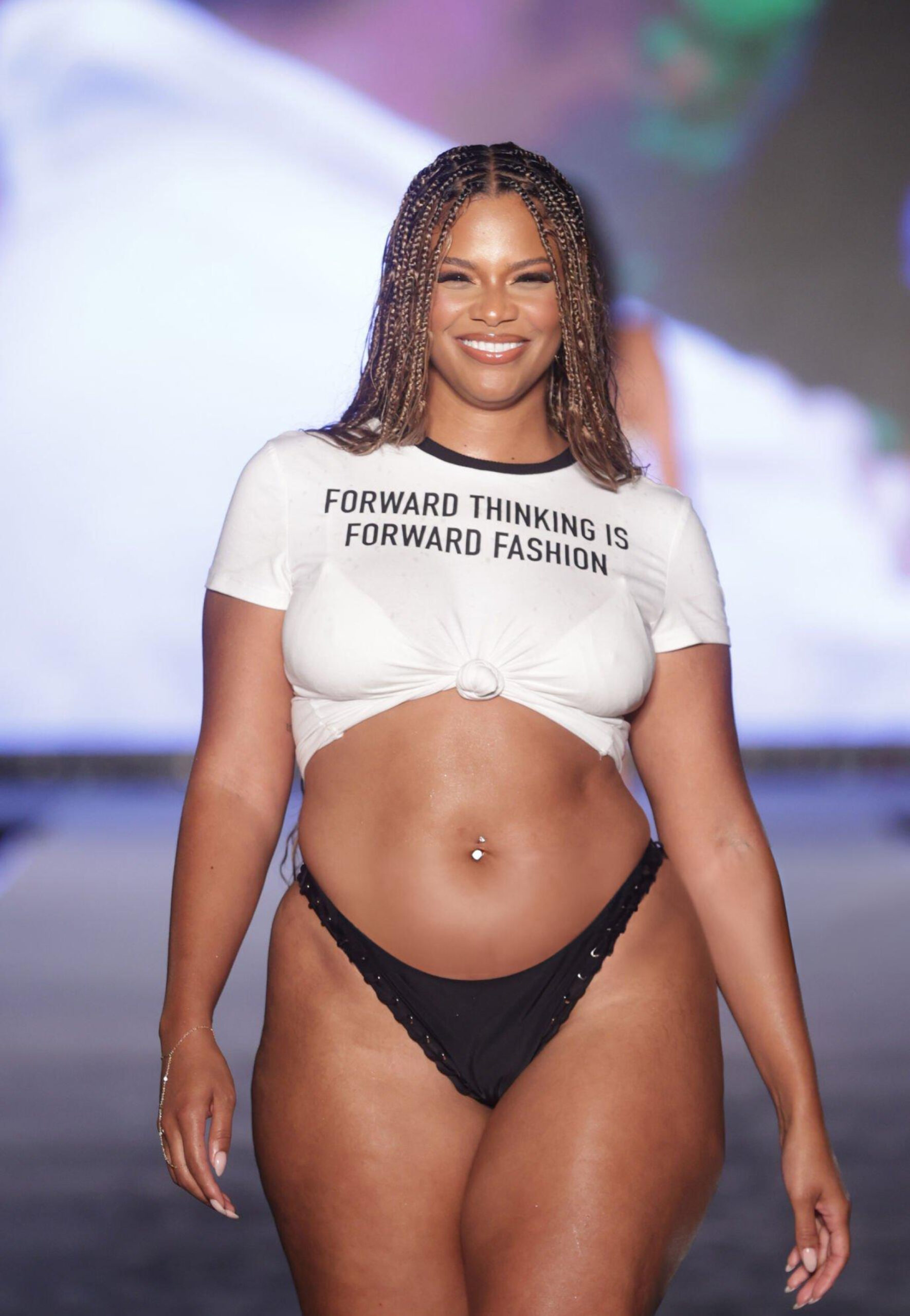 Kamie Crawford walks the runway during Sports Illustrated Swimsuit Show during Miami Swim Week at W Hotel Miami Beach on July 07, 2023 in Miami Beach, Florida.